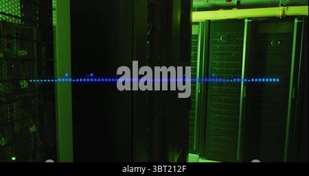 Bathing server room in green LED glow, showcasing rack cabinets with mesh cage, vents and waveform Stock Photo