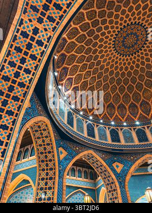 Traditional Islamic architecture with Turkish dome, Moroccan arches, and hanging chandelier Stock Photo
