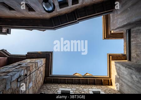 European style architecture with central courtyard and stone wall I Abstract architecture background Stock Photo