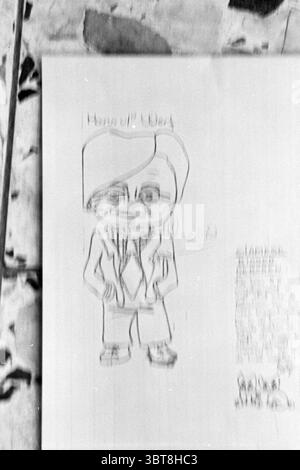 Fiorettie newspaper in Lisse Newspapers, Whizgle News, Dutch Desk, The Netherlands, 1950 - 2000 on 08-02-1974. The image shows these topics. The scene features a large sheet of paper, predominantly white, with a central drawing of a cartoon-like character. The character is depicted with exaggerated features, including large eyes and a distinctive hairstyle that frames a rounded face. The figure is dressed in a suit, characterized by broad shoulders and oversized proportions. Surrounding the main drawing, the background reveals a textured surface that appears to be a table or workspace, possibl Stock Photo