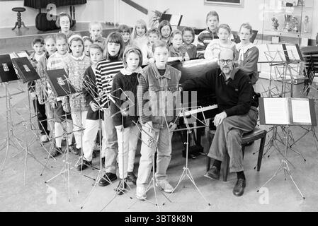 Children from a school choir, dressed in traditional regional costumes ...
