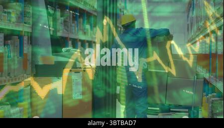 Operating man wearing hard hat coveralls moving in warehouse with forklift, racks and data overlay Stock Photo