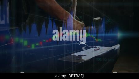 Hammering leather-aproned blacksmith forging glowing rod on anvil in forge with financial overlays Stock Photo