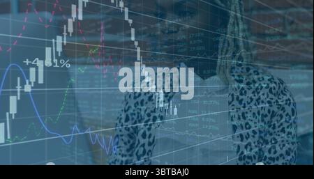 Standing woman in leopard blazer analyzing financial overlays in office with percentages Stock Photo