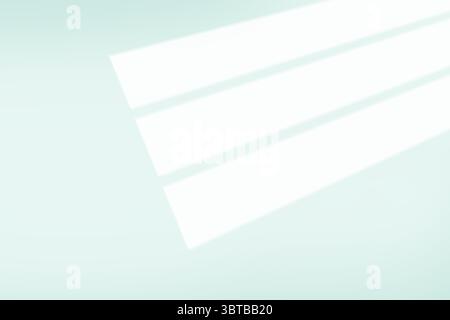 Abstract illustration is showing angled white light beams across pale teal surface implying window Stock Photo