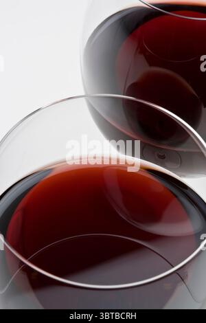 closeup of two wine glasses isolated on white background in studio Stock Photo