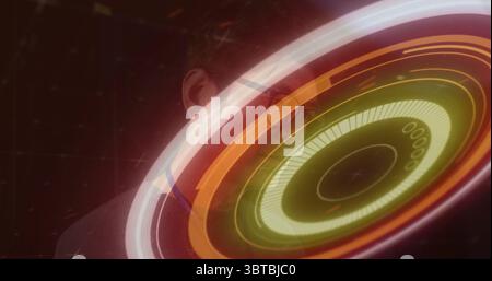 Displaying glowing holographic interface floating in research lab, with grid overlay and data rings Stock Photo