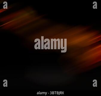Diagonal orange and red light streaks are moving through abstract flat scene, with black void Stock Photo