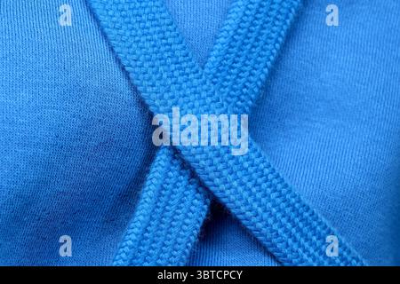 Textile blue background large knitted wool fabric, close-up background, macro photography Stock Photo