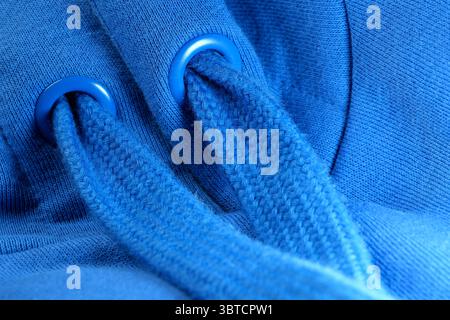 Textile blue background large knitted wool fabric, close-up background, macro photography Stock Photo
