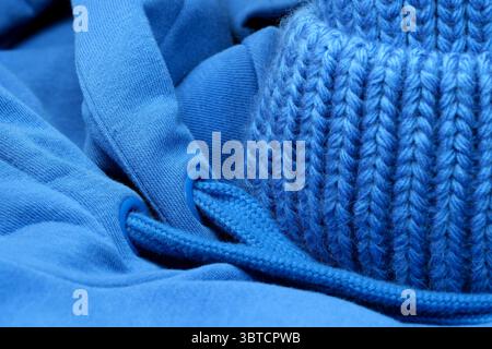 Textile blue background large knitted wool fabric, close-up background, macro photography Stock Photo