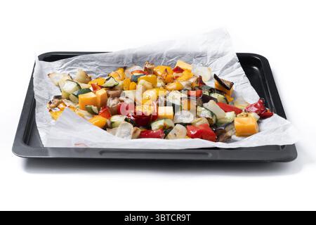 Roasted vegetables isolated on white background Stock Photo