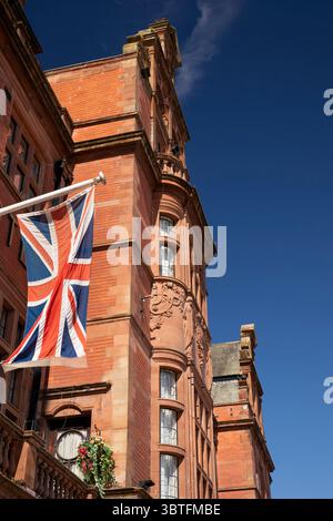 UK, England, Cumbria, Carlisle, Castle Street, Union flag flying outside Crown and Mitre Hotel Stock Photo