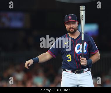 Seattle Mariners catcher Cal Raleigh bats during the fifth inning of a spring training baseball ...