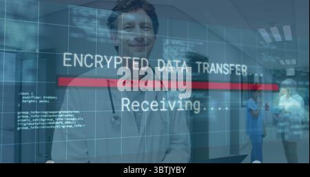 Displaying encrypted data overlay over male doctor in hospital corridor with stethoscope and code Stock Photo