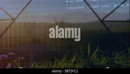 Displaying translucent financial data overlay over grassy meadow, with grid and percentage labels Stock Photo