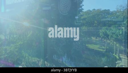 Displaying UI overlay mapping world data over pond path in city park with benches, sun glare Stock Photo
