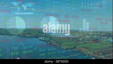 Displaying trading overlay on coastal harbor bay, with stock tickers and line graphs Stock Photo