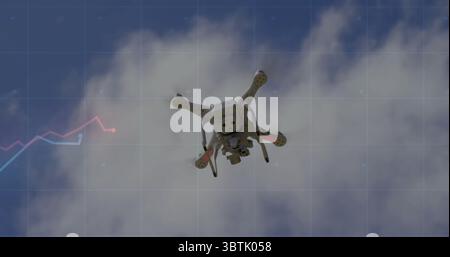 Hovering white quadcopter drone flying in cloudy sky, with grid overlay and colored chart segments Stock Photo