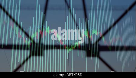 Displaying lattice tower silhouette standing at dusk, with green red candlesticks and teal bars Stock Photo