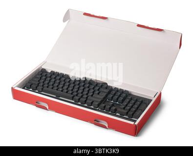 black mechanical gaming keyboard in opened packaging box isolated white background, mock-up template of gaming hardware Stock Photo