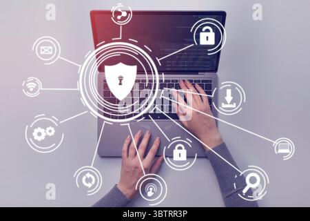 Hacker attack concept. Woman hands on laptop Stock Photo