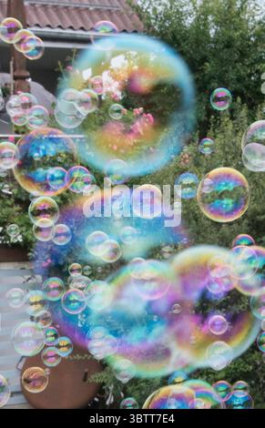 making soap bubbles as a symbol of dreams and joy soap bubbles as a ...