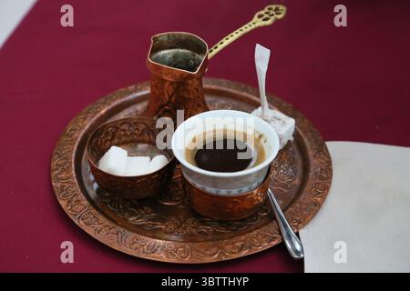 A cup of Turkish coffee, served from a copper cezve in the Old Town of Mostar, Bosnia and Herzegovina Stock Photo