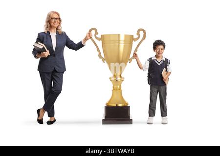 Teacher and student winning a big gold trophy cup isolated on white background Stock Photo