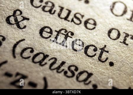 Words effect and causa on dictionary page, macro close-up Stock Photo