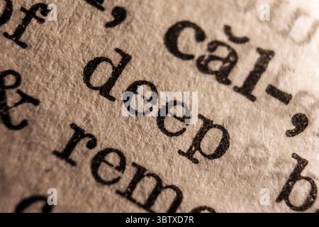 Word deep on dictionary page, macro close-up Stock Photo