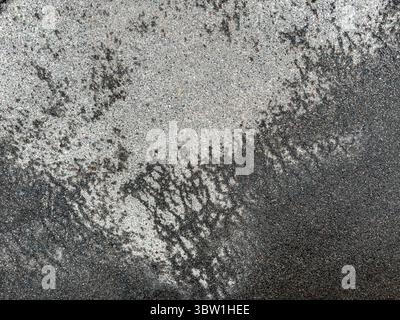 wet gray asphalt road after the rain. rainy weather background. high resolution. Stock Photo