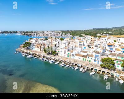 Portocolom fishing village on Mallorca island aerial view from above with boats summer holiday by the sea in Spain Stock Photo