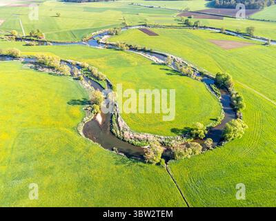 Young Danube river landscape aerial view from above traveling near Geisingen in Germany Stock Photo