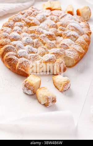 Czech Buchteln, yeast dumplings, sweet rolls on white kitchen table Stock Photo