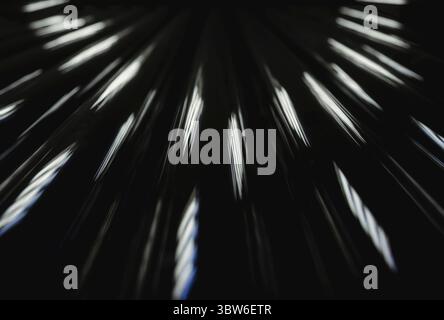 Glare light in the dark perspective view abstract background pattern Stock Photo