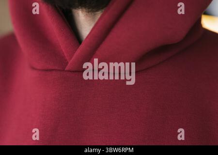 Hoodie texture. Close-up shot of sweatshirt hoodie brown textile warm fabric macro background Stock Photo