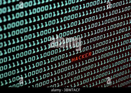Hacker text and binary code concept from the desktop computer screen, selective focus, Security Technology concept, internet hacker concept Stock Photo