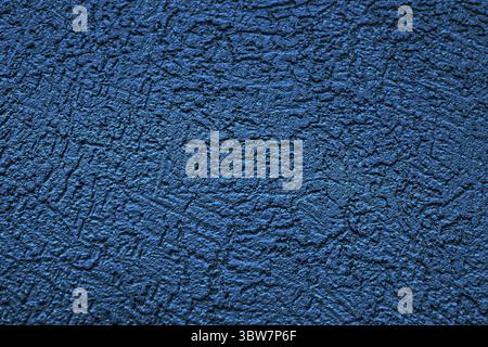 The wall is made of plaster with scratches. Rough surface. abstract blue background. A template for the design of a website or ad Stock Photo