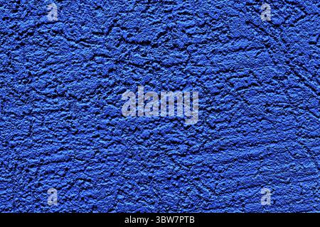 The wall is made of plaster with scratches. Rough surface. abstract blue background. A template for the design of a website or ad Stock Photo