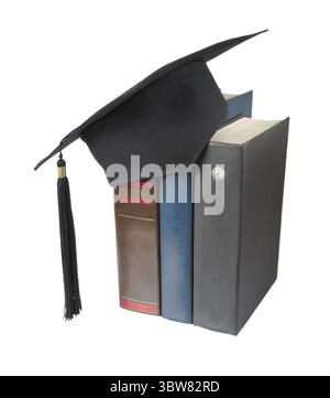 Black graduate hat and big books, isolated on white background Stock Photo