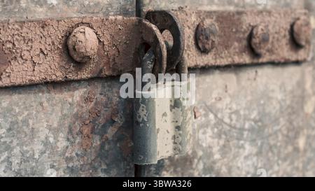 Old lock on an iron door close up Stock Photo