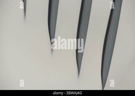 Gray abstract background from curved lines of geometric shapes minimalistic design pattern Stock Photo