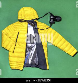 Yellow man jacket with a camera decor isolated Stock Photo
