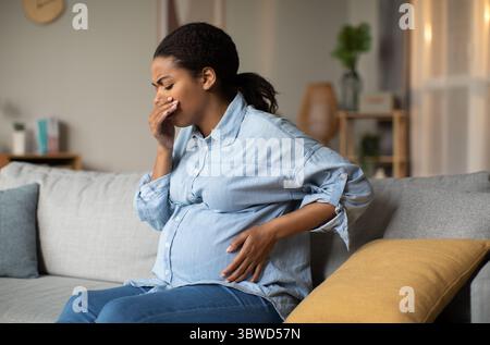 Labor Sickness Pregnant Black Lady Having Labor Pains Sitting With Husband Indoor ...