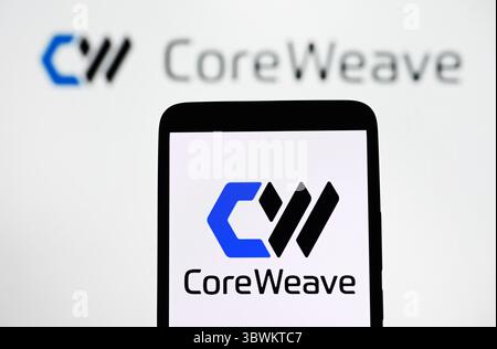 Ukraine. 29th Dec, 2024. In this photo illustration, a CoreWeave Inc. logo of an US AI cloud-computing startup is seen on a smartphone and in the background. (Credit Image: © Pavlo Gonchar/SOPA Images via ZUMA Press Wire) EDITORIAL USAGE ONLY! Not for Commercial USAGE! Stock Photo