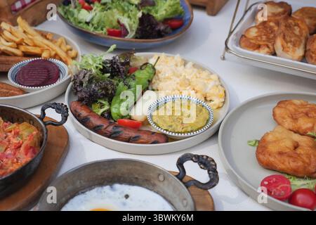 Delicious spread of various dishes at a festive gathering Stock Photo