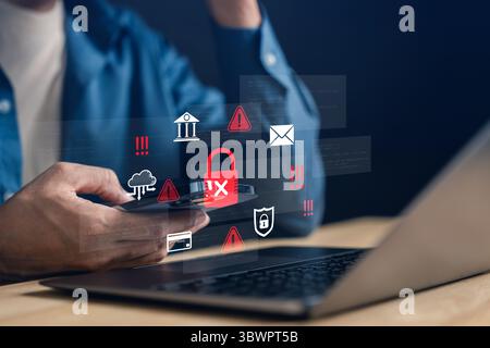 Online transaction alert and scam warning with lock icon and danger, cyber fraud, data breach, and Stock Photo