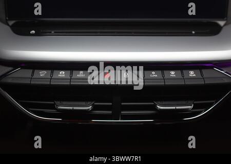 Climate control panel in modern car. Knobs and dashboard panel Stock Photo