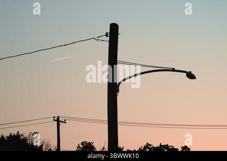 street light against a blue sky background with clouds Stock Photo